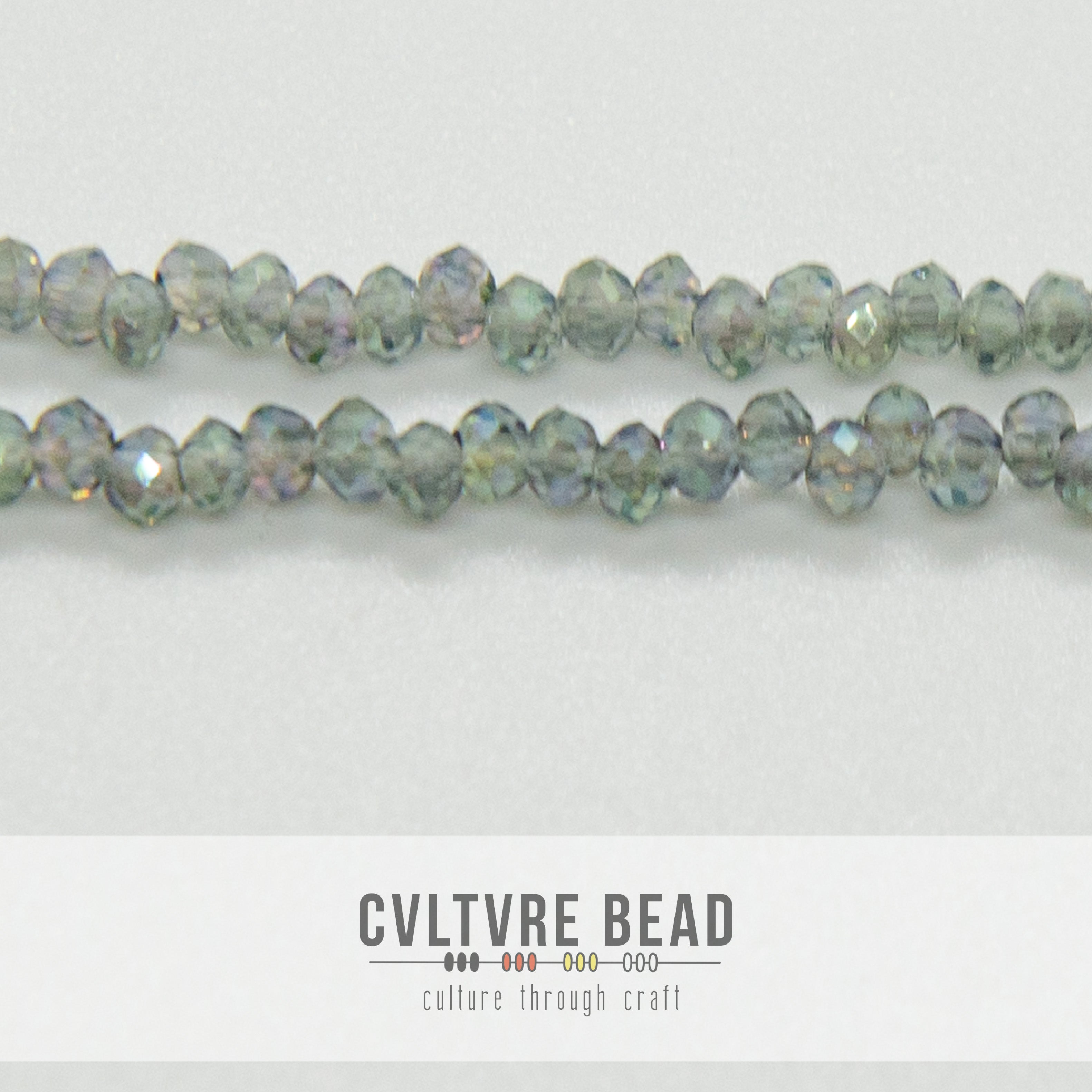 Crystal Lane Rondelle - 1.5x2.5mm -  Trans. Green Luster